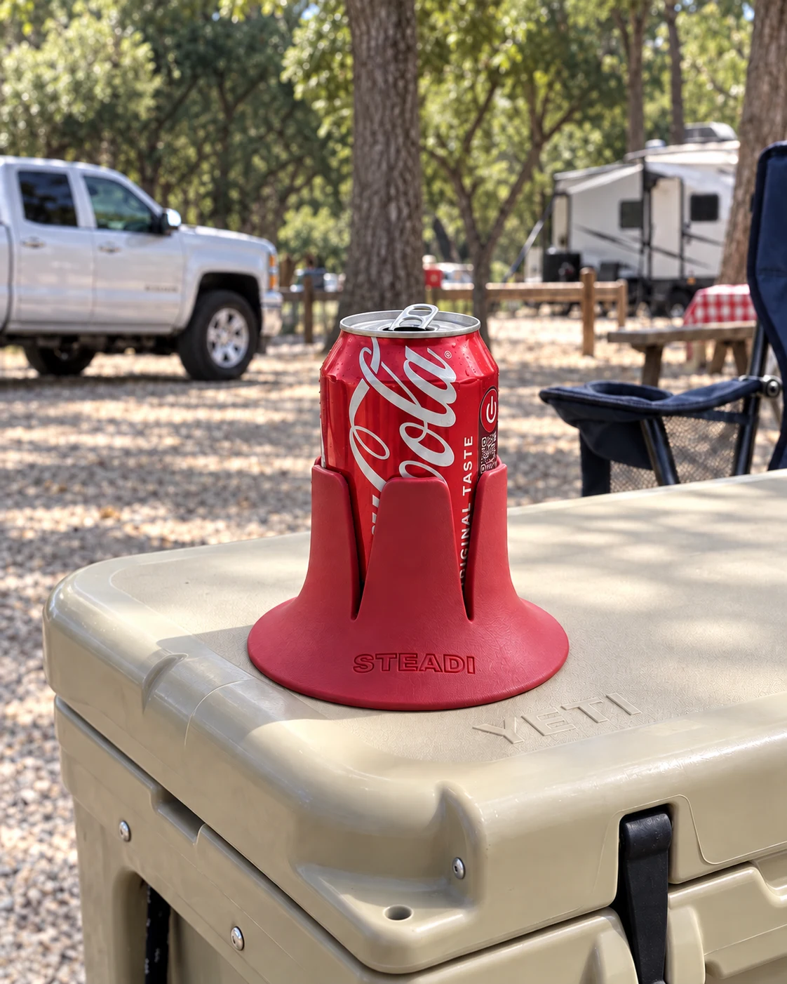 A soda can in a red Steadi on a cooler at an outdoor gathering. AI lifestyle illustration.